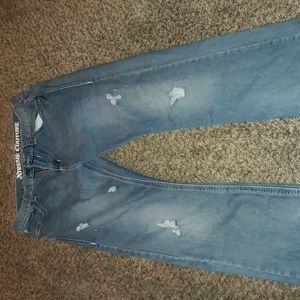 Xtreme couture light wash with Ripped spots